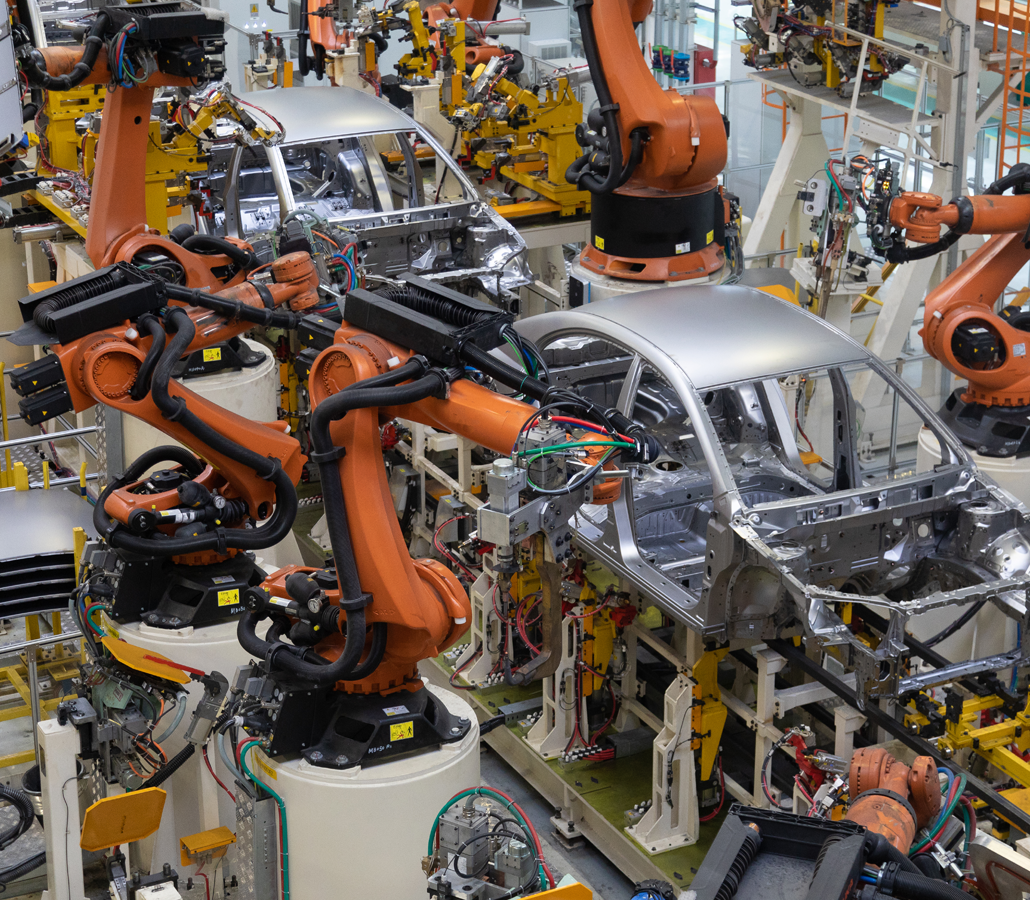 Robots on an automotive assembly line